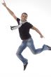 young male leaps in air