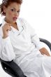 sitting female doctor holding eyewear