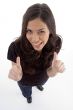 standing young woman showing thumb up