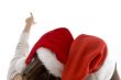 female heads wearing christmas hats