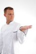 standing chef looking his palm