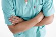 folded hands of doctor