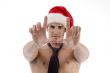 male wearing christmas hat and making