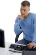 man looking at computer