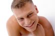 close up of smiling muscular man