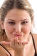 pretty woman giving flying kiss