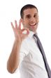 smiling professional man showing ok gesture