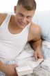 handsome male reading book