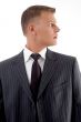 young businessman looking sideways