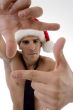 male model wearing christmas hat and framing