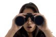 astonished female watching through binocular