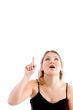 pretty woman pointing upwards