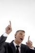 man showing happiness and indicating upwards