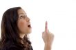 young woman pointing up