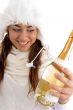 smiling female holding champaign bottle