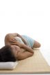 side view of young woman in relaxation pose