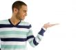 handsome male holding something with hand gesture