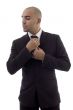 young accountant adjusting his tie