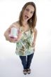 young woman showing her toothbrush