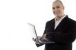 successful executive busy with laptop