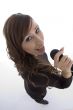 model singing in microphone