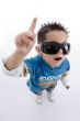 pointing cute little boy with sunglasses