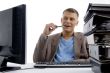 young man sitting in office