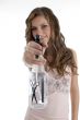 smiling young beautician showing spray bottle