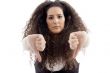 beautiful woman showing thumbs down