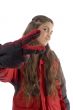 woman wearing jacket showing victory hand gesture