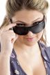 pretty model holding sunglasses