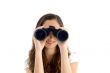 smiling female watching through binocular