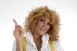 smiling woman pointing upside