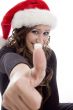 woman wearing christmas hat showing good