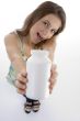 woman posing with plastic bottle