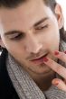 lips of man being touched by female hands