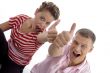 corner view of couple with thumbs up