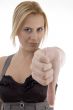 woman showing thumbs down gesture