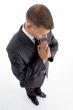 high angle view of praying businessman