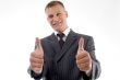 happy executive with thumbs up