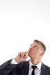 portrait of businessman asking to keep silent