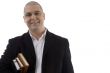 smiling businessman with books