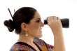 side pose of female watching through binocular