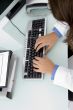 doctor`s hand on keyboard