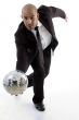 smart young executive tumbling disco ball