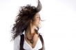 fashionable teen with her hair fluttering in air