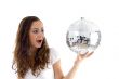 female holding mirror ball with one hand