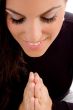 portrait of praying woman