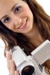 young female holding handy cam