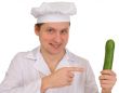 Cook with cucumber in hand